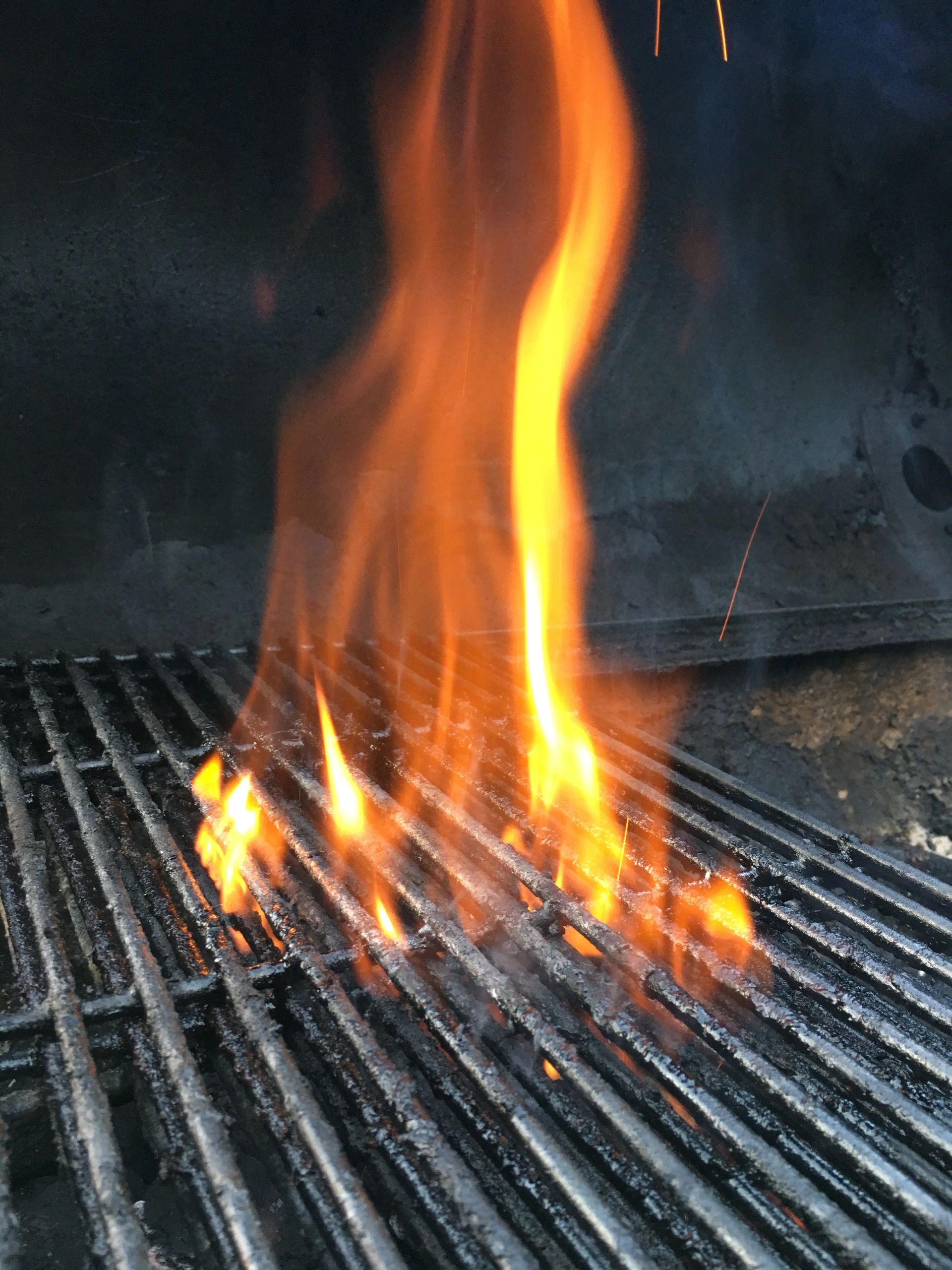 Flames on grill grate